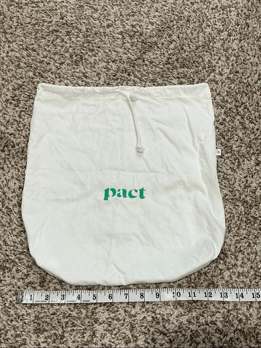 Pact Natural Canvas Drawstring Pouch with Green Logo